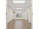 Sunlit office space featuring hardwood floors, neutral paint and window view at 2317 Rocksram Ct, Buford, GA 30519