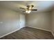 Bedroom featuring a ceiling fan and modern flooring at 820 Emerald Forest Cir, Lawrenceville, GA 30044