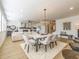 Bright dining area featuring a modern chandelier, stylish table, and comfortable seating at 1715 Fulmont Cir, Mableton, GA 30126