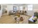 Cozy living room featuring hardwood floors, comfortable seating, and lots of light at 1715 Fulmont Cir, Mableton, GA 30126
