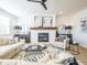Inviting living room featuring a fireplace, stylish furniture, and ample natural light at 1715 Fulmont Cir, Mableton, GA 30126