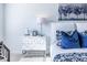 Bright main bedroom features carpeted floors, ceiling fan, and ensuite bathroom at 1715 Fulmont Cir, Mableton, GA 30126