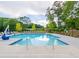 Bright community pool with a zero entry and a chair lift at 1715 Fulmont Cir, Mableton, GA 30126