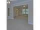 Bright and spacious bedroom features a ceiling fan, a large window, and an adjoining bathroom at 1871 Birch Briar Bnd, Lawrenceville, GA 30043