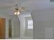 Bedroom with neutral color palette, lots of natural light, and a ceiling fan at 1871 Birch Briar Bnd, Lawrenceville, GA 30043