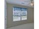 Bright bedroom features two windows with view and neutral carpet at 1871 Birch Briar Bnd, Lawrenceville, GA 30043
