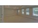 Spacious bedroom with many windows and natural light at 1871 Birch Briar Bnd, Lawrenceville, GA 30043