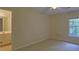 Bedroom featuring natural light and neutral carpet at 1871 Birch Briar Bnd, Lawrenceville, GA 30043