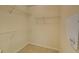 Walk-in closet with wire shelving units and a security system at 1871 Birch Briar Bnd, Lawrenceville, GA 30043