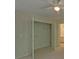 Bedroom closet featuring open doors and rod and shelf storage at 1871 Birch Briar Bnd, Lawrenceville, GA 30043