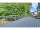 Inviting back deck with metal railings offers a relaxing outdoor space at 1871 Birch Briar Bnd, Lawrenceville, GA 30043