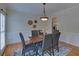 Charming dining room with hardwood floors, stylish furnishings and natural light at 1871 Birch Briar Bnd, Lawrenceville, GA 30043
