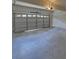 Spacious, clean garage with ample storage space and an automatic door at 1871 Birch Briar Bnd, Lawrenceville, GA 30043