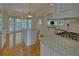 Bright kitchen with granite countertops, stainless steel appliances, and a large island at 1871 Birch Briar Bnd, Lawrenceville, GA 30043