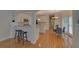 Charming kitchen with white cabinets, granite countertops, and a breakfast bar for casual dining at 1871 Birch Briar Bnd, Lawrenceville, GA 30043