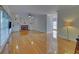 Spacious living room with hardwood floors, fireplace, and built-in shelving at 1871 Birch Briar Bnd, Lawrenceville, GA 30043