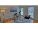 Bright office space featuring hardwood floors and a large window providing natural light at 1871 Birch Briar Bnd, Lawrenceville, GA 30043