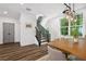 Bright dining area features wood floors, a staircase and a large window at 24 Becker Nw Pl, Atlanta, GA 30307