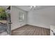 A bright bedroom with hardwood floors and a large window for natural light at 2531 Ridgecrest Nw Dr, Kennesaw, GA 30152