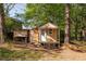 Cozy outbuilding with a shed, perfect for a workshop or storage, adding versatility to the property at 2531 Ridgecrest Nw Dr, Kennesaw, GA 30152