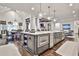 Elegant dining room with a stylish chandelier, beams, and a seamless transition to the kitchen at 4140 Hillside Nw Pl, Atlanta, GA 30342