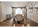 Sophisticated dining room with hardwood floors, stylish chandelier, and elegant decor at 4140 Hillside Nw Pl, Atlanta, GA 30342