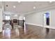 Spacious second story hallway with gleaming hardwoods and a dark wood staircase at 4140 Hillside Nw Pl, Atlanta, GA 30342