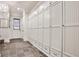 Hallway features slate flooring, storage lockers, and adjacent door at 4140 Hillside Nw Pl, Atlanta, GA 30342