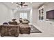 Comfortable living room featuring plush seating and built-in shelving at 4140 Hillside Nw Pl, Atlanta, GA 30342