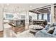 Expansive open-concept living with a large kitchen island and coffered ceilings at 4140 Hillside Nw Pl, Atlanta, GA 30342