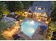 Backyard paradise featuring a large pool, gazebo, and lush landscaping at 4140 Hillside Nw Pl, Atlanta, GA 30342