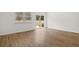 Living room with a sliding glass door and a large window at 225 Kenoot Dr # 50, Mcdonough, GA 30253