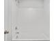 Bright bathroom features a tub with a white tiled surround at 6935 Melody Ridge Rd, Buford, GA 30518