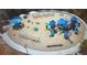 Aerial view of playground with colorful play structures and shaded areas for recreation at 6935 Melody Ridge Rd, Buford, GA 30518
