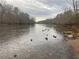 Scenic view of the river, enhancing the appeal of the surrounding natural environment and nearby community at 6935 Melody Ridge Rd, Buford, GA 30518