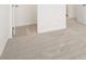Bright bedroom has neutral walls and carpet, with white doors leading to closet and bathroom at 205 Kenoot Dr # 55, Mcdonough, GA 30253
