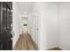 Inviting entryway with wood-look floors and neutral walls, leading to living spaces at 205 Kenoot Dr # 55, Mcdonough, GA 30253