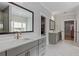 Modern bathroom featuring double vanities, white countertops and great closet access at 357 Mell Ne Ave, Atlanta, GA 30307