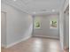 Bright bedroom featuring hardwood floors, recessed lights, and windows providing natural light at 357 Mell Ne Ave, Atlanta, GA 30307