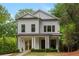 Beautiful two-story home featuring a classic design and a well-maintained front yard at 357 Mell Ne Ave, Atlanta, GA 30307
