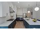 Spacious kitchen features stainless steel appliances, custom cabinets and oversized island with seating at 357 Mell Ne Ave, Atlanta, GA 30307
