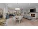 Bright living space with a fireplace, hardwood floors, and comfortable seating at 357 Mell Ne Ave, Atlanta, GA 30307