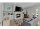 Comfortable living area with a fireplace and French doors at 357 Mell Ne Ave, Atlanta, GA 30307