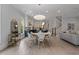 Spacious open-concept living area featuring a dining area and modern kitchen at 357 Mell Ne Ave, Atlanta, GA 30307