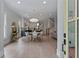 Open-concept living space with hardwood floors and modern lighting at 357 Mell Ne Ave, Atlanta, GA 30307