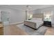 Spacious bedroom with a decorative rug and access to an ensuite bathroom at 357 Mell Ne Ave, Atlanta, GA 30307