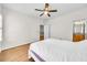 Bedroom with hardwood floors and access to the ensuite bathroom at 3676 Brookhaven Manor Ne Xing, Atlanta, GA 30319