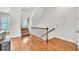 Bright hallway with wood floors and staircase at 3676 Brookhaven Manor Ne Xing, Atlanta, GA 30319