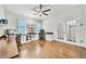 Bright office featuring a ceiling fan, french doors and built in shelves and desks at 3676 Brookhaven Manor Ne Xing, Atlanta, GA 30319