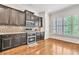 Beautiful kitchen with stainless steel appliances, custom cabinets and granite countertops at 3676 Brookhaven Manor Ne Xing, Atlanta, GA 30319